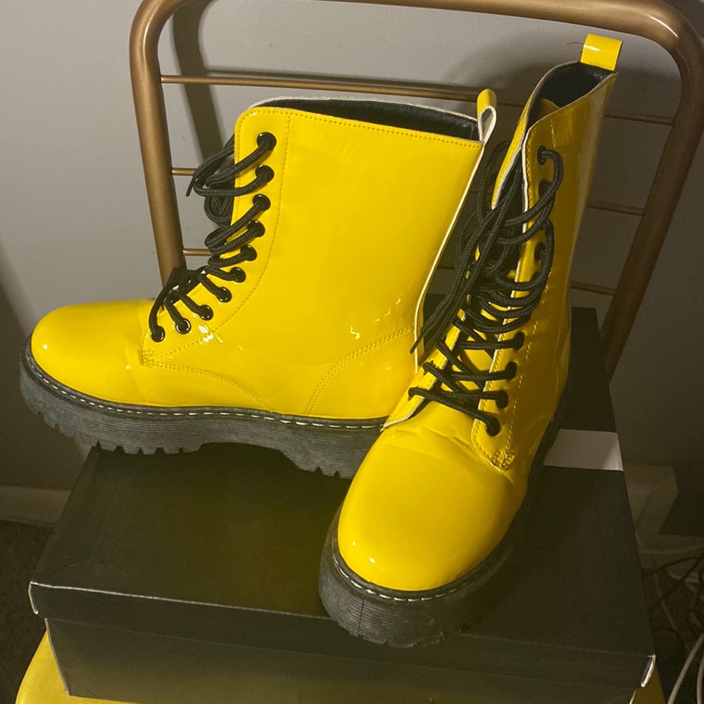 Yellow and black combat boots
